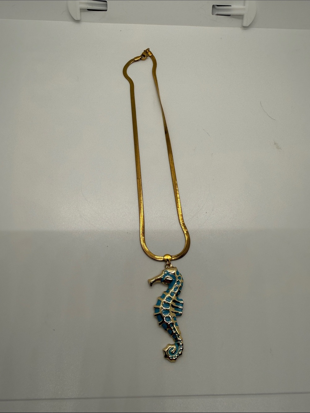 Gold-Tone Necklace with Blue Seahorse Pendant